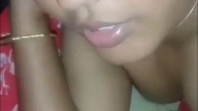 A charming wife skillfully performs oral sex