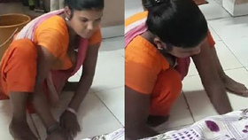 Indian maid with large breasts gets caught by her employer while cleaning the floor