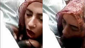 Arab woman in hijab performs oral sex in a vehicle