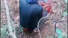 Older Indian woman has outdoor sex in the countryside