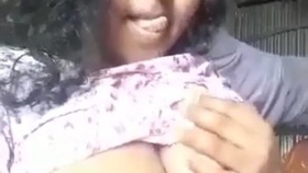 Village girl with big boobs satisfies herself through self-pleasure