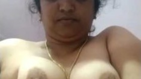 Older aunt removing her sari and touching herself