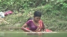 Indian housewife Ganga's sensual shower scene with ample cleavage