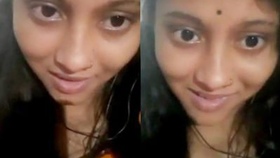 A lovely South Asian girlfriend reveals her large breasts during a video chat