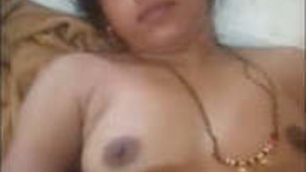 A stunning Indian wife experiences intense sex in a heated video