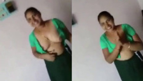 Indian aunt reveals her large breasts to a customer