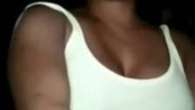 Arousing Indian woman reveals her large breasts and intimate area