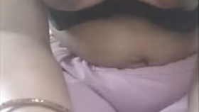 Busty Indian woman's large breasts on display in video