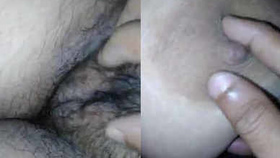 Punjabi wife with large breasts gets her hairy pussy played with by her husband