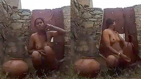 Country girl shares intimate self-portraits while bathing outdoors