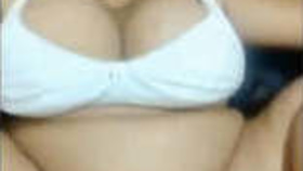 Sensual video of passionate intercourse featuring an attractive Indian woman
