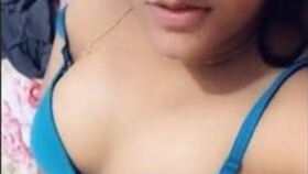 A pretty Punjabi girl flaunts her breasts and intimate parts