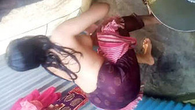 Village girl filmed showering