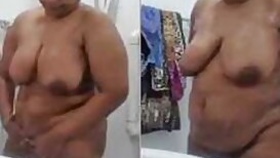Mature Desi actress deletes clothing items exposing XXX body on camera
