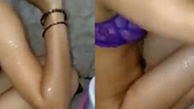 Indian hides XXX tits under her purple bra and washes body on camera