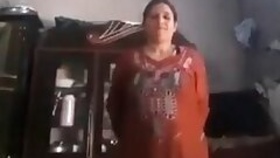 Paki lady takes her clothes off, showing her tits and pussy