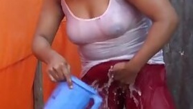 Titsy bangla lady showing off her nipple in her wet white t-shirt