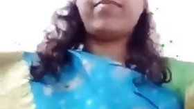 Desi bhabhi in a striped sari