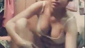Desi blonde beauty strips down to her panties in a bra on camera